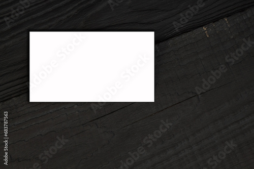 Blank business cards on the wooden table. Template for ID. Top view.