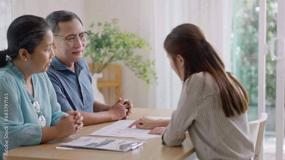 Ownership and New home,retirement concept.real estate agent give keys to new home to excited asia elderly couple clients.Asian Woman realtor or broker congratulate happy overjoyed with house purchase. Ownership and New home,retirement concept.real estate agent give keys to new home to excited asia elderly couple clients.Asian Woman realtor or broker congratulate happy overjoyed with house purchase.