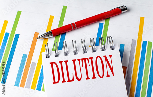Foto DILUTION text on a notebook with chart and pen business concept