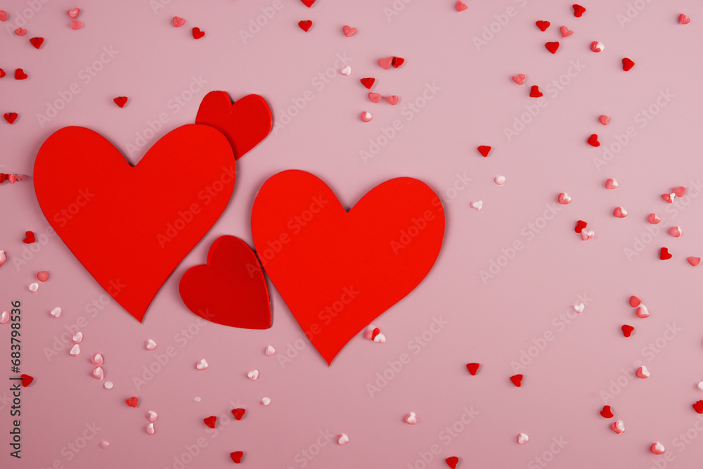 Valentine's Day. Red heart design. February 14th. 2024. Happy Valentine's Day background in red. 3d red hearts on pink background. Paper style. Place for text.