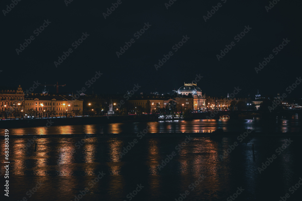 Night view of Prague's Old Town and the National Theater from Charles Bridge.