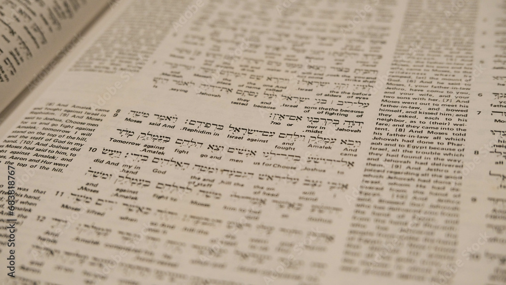 Close up of Holy Bible text in English and Hebrew, collection of library Close up of Holy Bible text in English and Hebrew, collection of library
