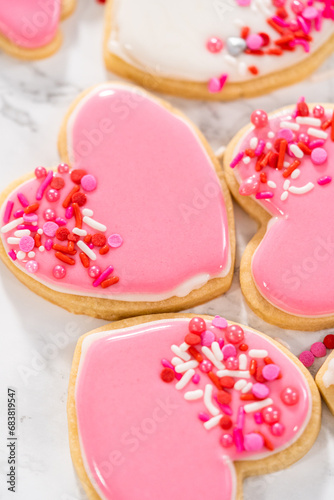 Heart-shaped sugar cookies with royal icing