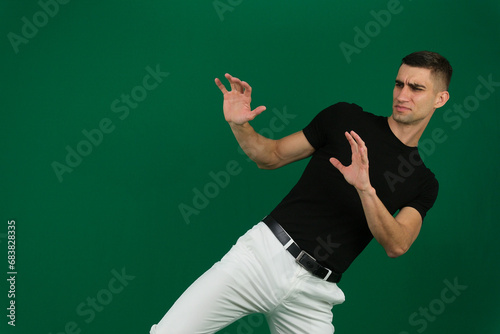 Side view portrait of a businessman punching isolated on a white background. High quality photo
