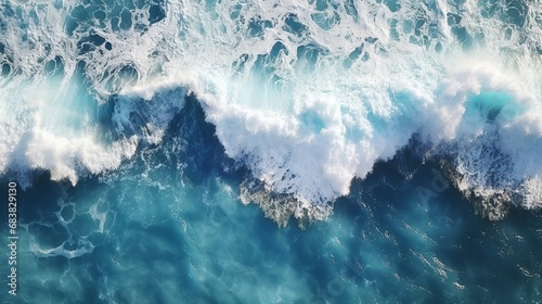 Large waves crashing onto a coral reef. An aerial view