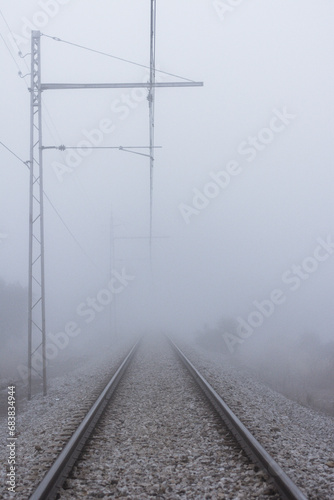Viás de tren con niebla photo