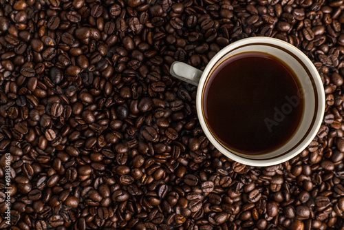 background with coffee beans and cup 