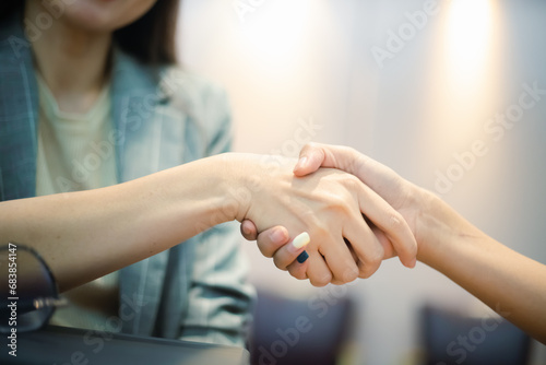 Business woman shaking hands and businessman to make business investment contract agreement successful business idea