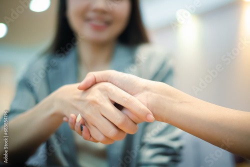 Business woman shaking hands and businessman to make business investment contract agreement successful business idea
