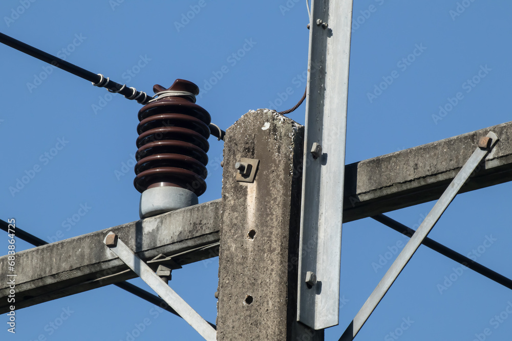 Obraz premium Closeup Eletricity line and electricity post