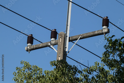 Closeup Eletricity line and electricity post photo