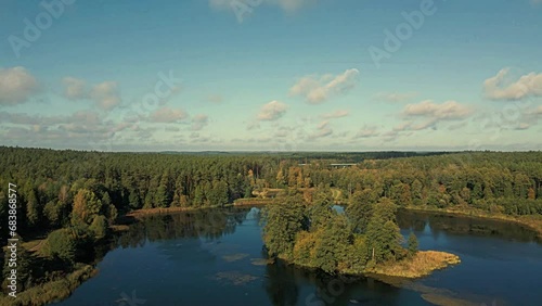 Aerial view of the lake in the middle of the Knyszyn Forest in Podlasie on a sunny,autumn day.
