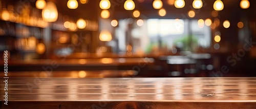 Vintage elegance. Blurred wooden table in dimly lit cafe ideal for creating retro atmosphere and showcasing products or ambiance