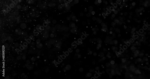 Heavy Dust Particles 2 1027 2K Real dust particles floating on black background. Slow motion  photo