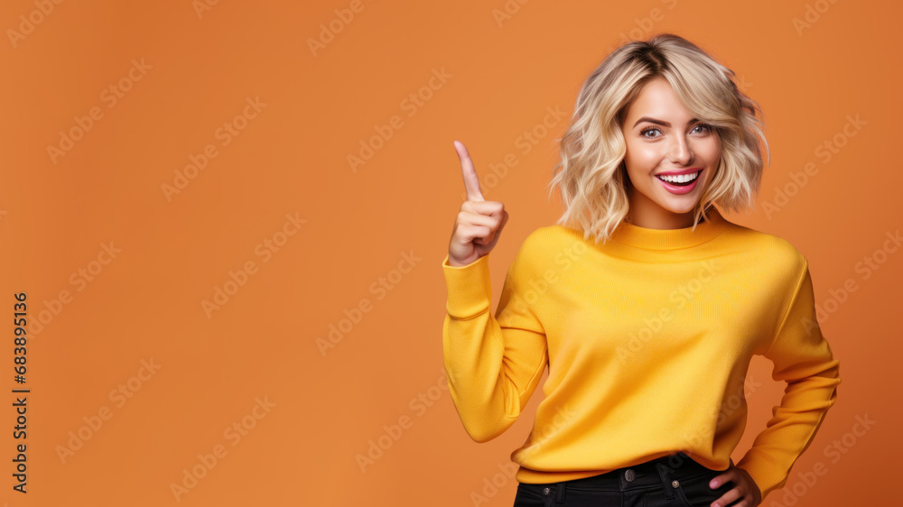 Happy blonde woman pointing her finger at copy space for promotion Happy blonde woman pointing her finger at copy space for promotion