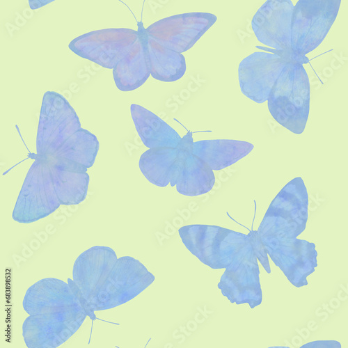 blue butterflies isolated on a light green background.