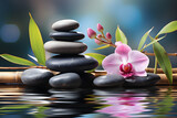 a stack or pyramid of stones, bamboo and an orchid in the water. balancing pebble stone. concept of relaxation, equilibrium.