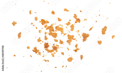 Pile crust bread crumbs, scattered pieces flying isolated on white, clipping path photo