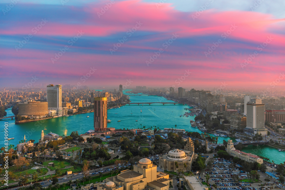 Exclusive aerial sunset panorama of central Cairo, the Nile and the bridges, Egypt