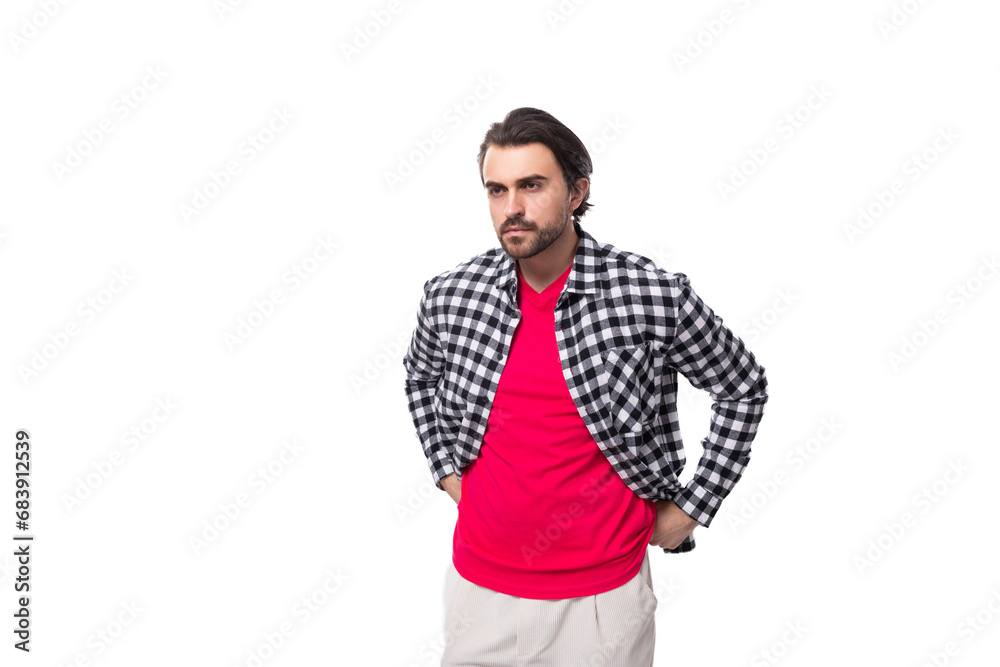 young well-groomed brutal European brutal guy with gorgeous hair and beard on a white background with copy space young well-groomed brutal European brutal guy with gorgeous hair and beard on a white background with copy space