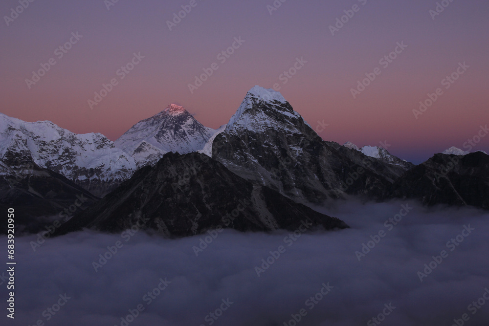 Pink sky over Mount Everest at sunset, Nepal.