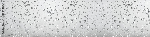 Bubbles in water on white background. Closeup. Long banner