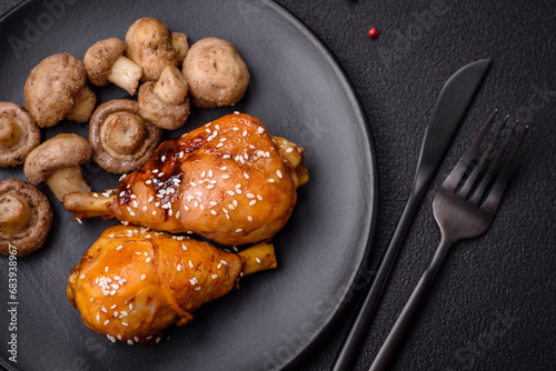 Delicious Asian dish with chicken legs in teriyaki sauce with salt and spices