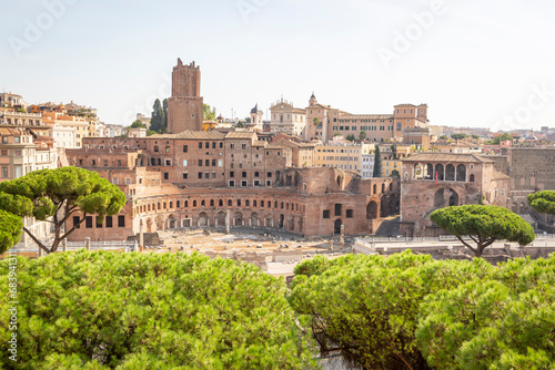 a view of the Roman square, the Trajan's Forum (Mercati di Traiano) and Tower of the Militias (Torre delle Milizie) in Rome, Lazio, Italy photo