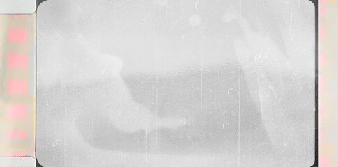 scan of blank 16mm film frame with black border and smear marks, mock up, blend in your photo via blend mode.