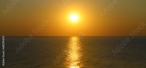 Sunset with sun path on surface of sea. © Serghei V