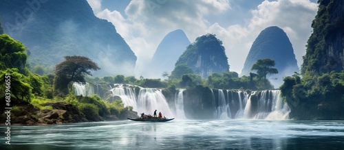 Leinwand Poster Cascade human fishing on boat with natural rural landscape