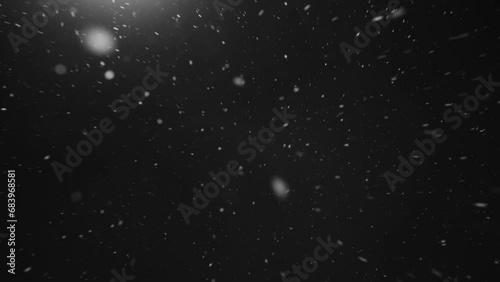 Snow overlay 4k video footage. Real snowfall against black night sky and lantern light