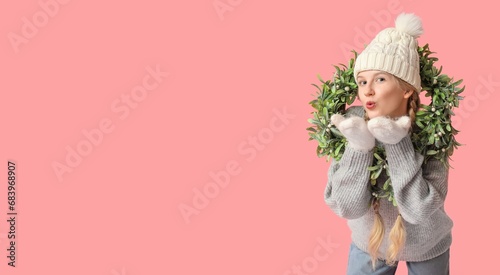 Pretty young girl with Chri...