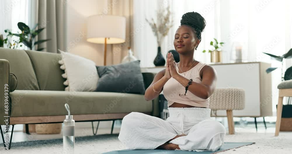 Yoga, lotus or black woman in meditation in home praying for wellness, calm peace or balance. Lounge, relax or zen African person in pilates pose for energy training, breathe or holistic exercise Yoga, lotus or black woman in meditation in home praying for wellness, calm peace or balance. Lounge, relax or zen African person in pilates pose for energy training, breathe or holistic exercise