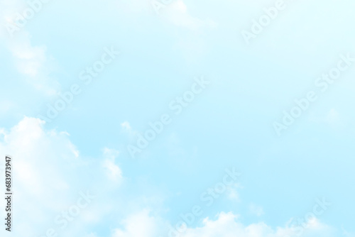 Blue pastel sky with white fluffy cloud. Cumulus clouds background. Cloudscape morning sky. The concepts of freedom of live, never give up and positive though energy. 