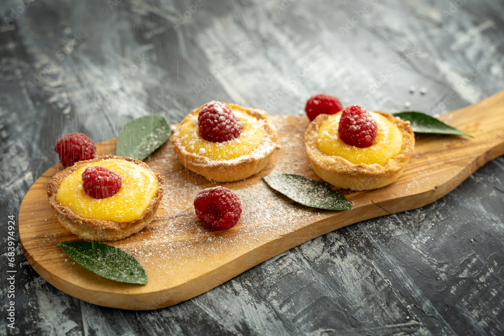Homemade lemon pie with raspberry