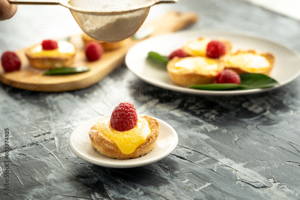 Homemade lemon pie with raspberry