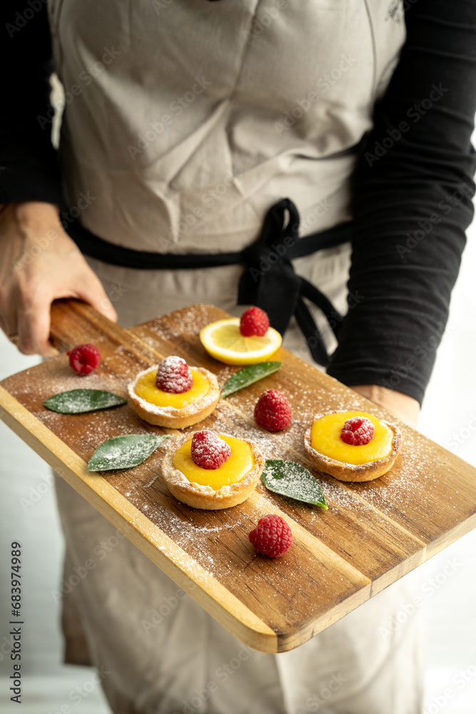Homemade lemon pie with raspberry