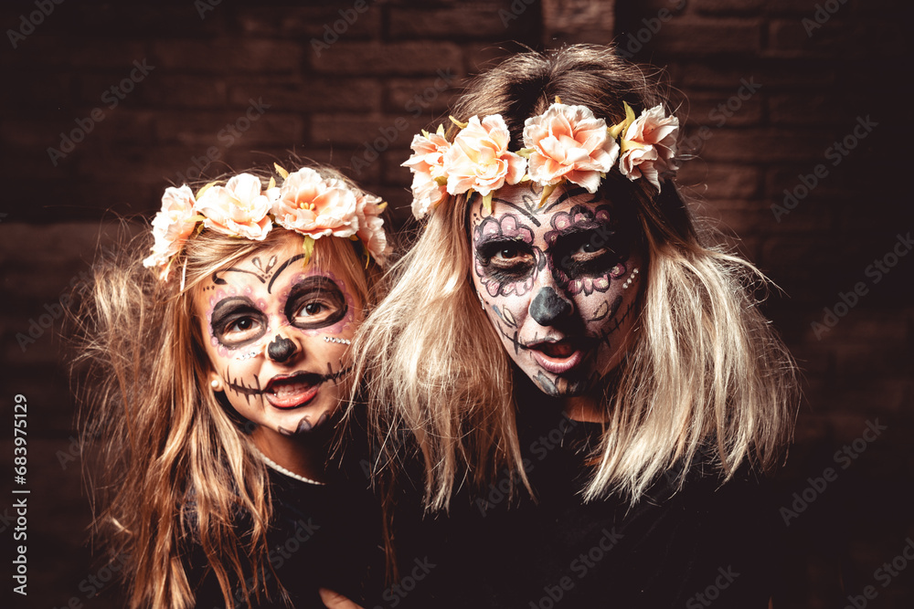mom daughter face paint for festive scary halloween party flowers