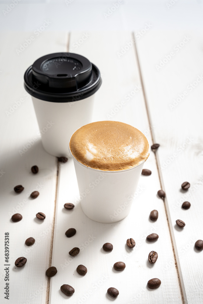 espresso takeaway coffee cup and lid
decorated with coffee
beans