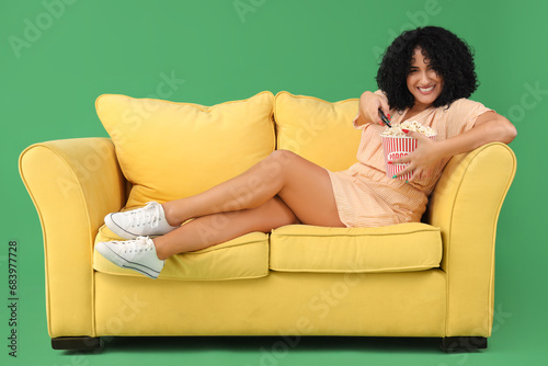 Beautiful woman with popcor...