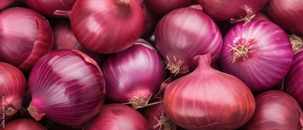 Heap of organic aromatic red onions full frame background Heap of organic aromatic red onions full frame background