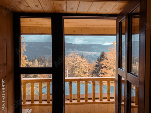 View from the window of a modular prefabricated house in the mountains. Mountain landscape