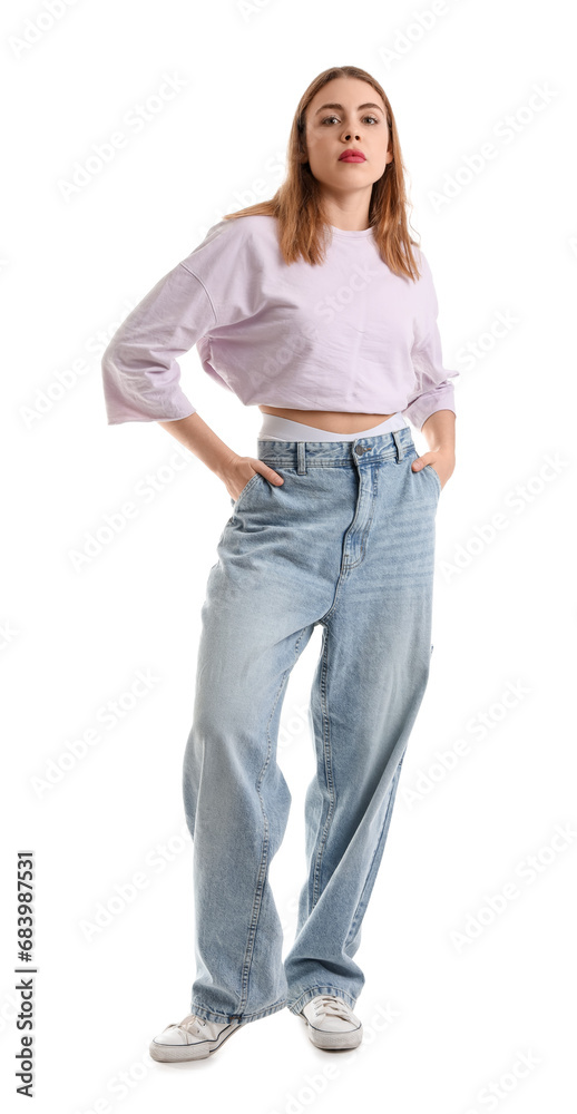 Young woman in trendy jeans on white background Young woman in trendy jeans on white background