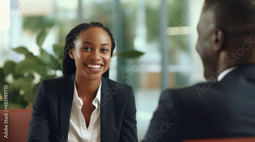 Portrait of an african american business woman smiling in office