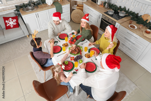 Happy family in Santa hats ...