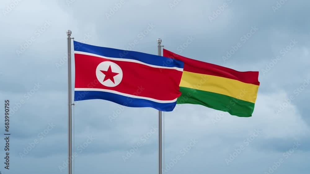 Bolivia flag and North Korea flag waving together on cloudy sky, endless seamless loop, two country relations concept Bolivia flag and North Korea flag waving together on cloudy sky, endless seamless loop, two country relations concept