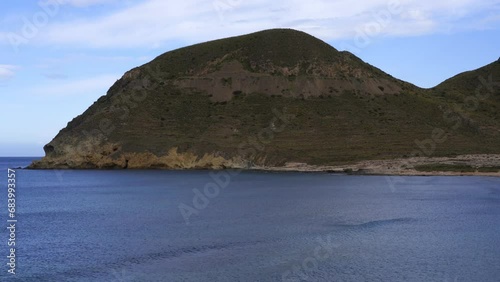 Playazo de Rodalquilar beach with mountain landscape, in Spain photo