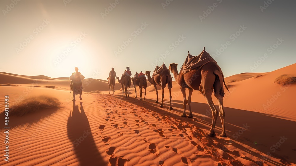 Caravan with group of tourists riding camels through Dubai desert during safari adventure - obrazy, fototapety, plakaty 
