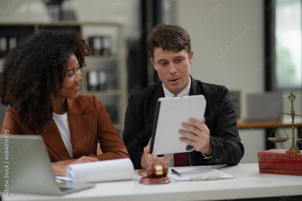 Judge gavel with Justice lawyers having team Concepts of Law and Legal services Judge gavel with Justice lawyers having team Concepts of Law and Legal services